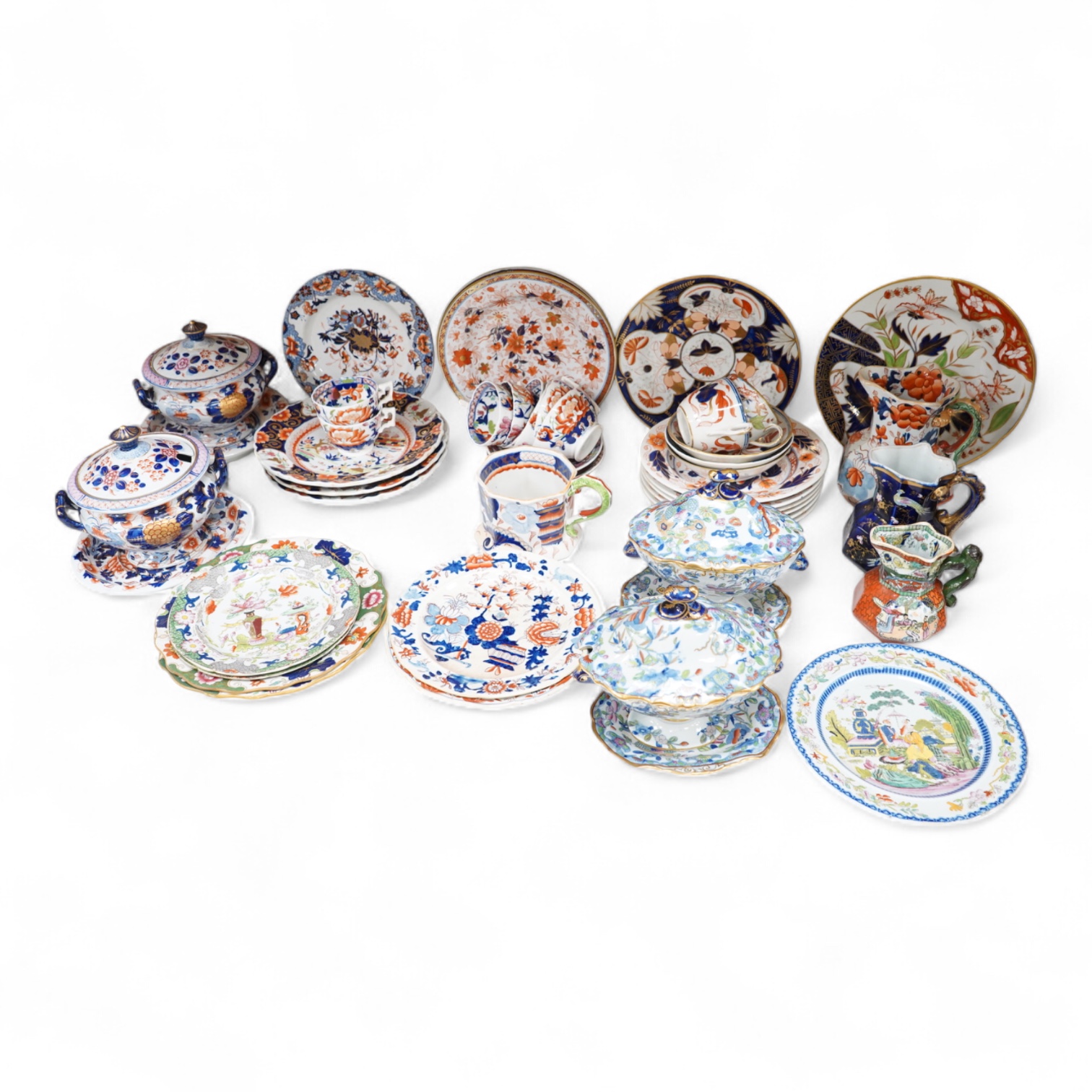 A collection of 19th century English ironstone china to include two pairs of sauce tureens, covers and stands, one marked Masons, various side plates and teacups